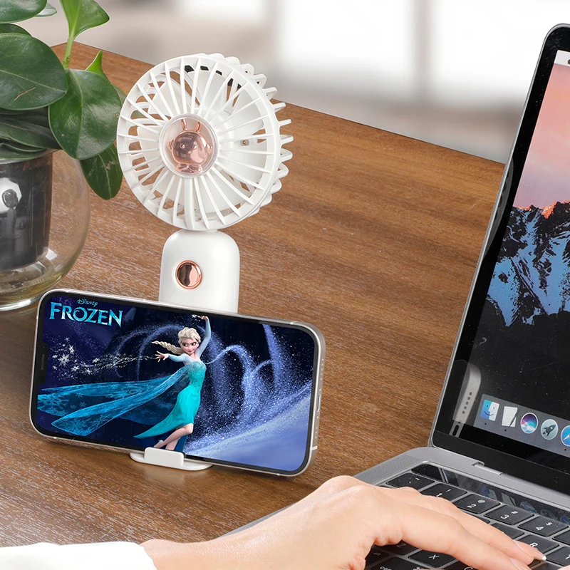 الجملة 1200 مللي أمبير مروحة صغيرة محمولة وحامل الهاتف الذكي قاعدة طاولة قائمة تعمل بالبطارية للاستخدام المنزلي للسيارة والمنزلية