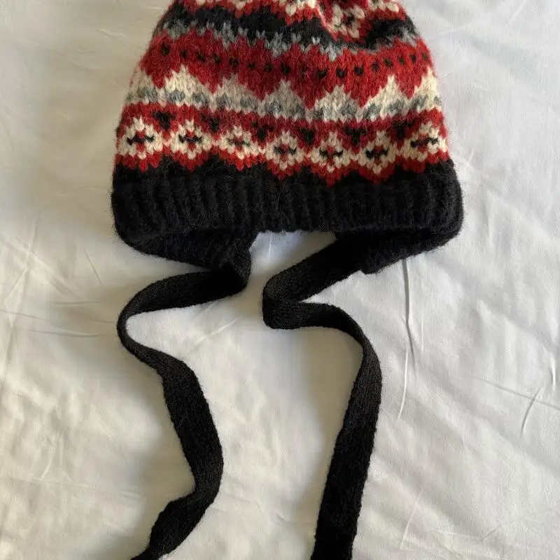 جديد فتاة الشتاء قبعة لطيف الطباعة تنوعا موضة حسن المظهر الدفء الحياكة الصوف متماسكة قبعة امرأة غطاء الأذن بالجملة