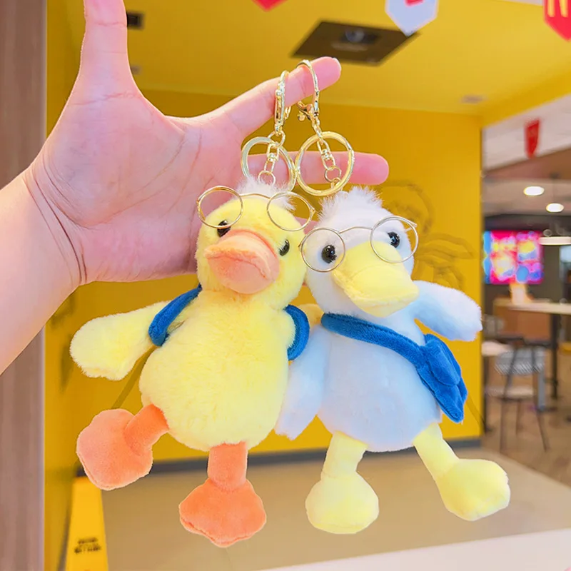 Animais de pelúcia Chaveiro de pelúcia Óculos fofos Brinquedos de boneca de pato Pingente de mochila Saco Keychain Acessórios de livros Saco de livro