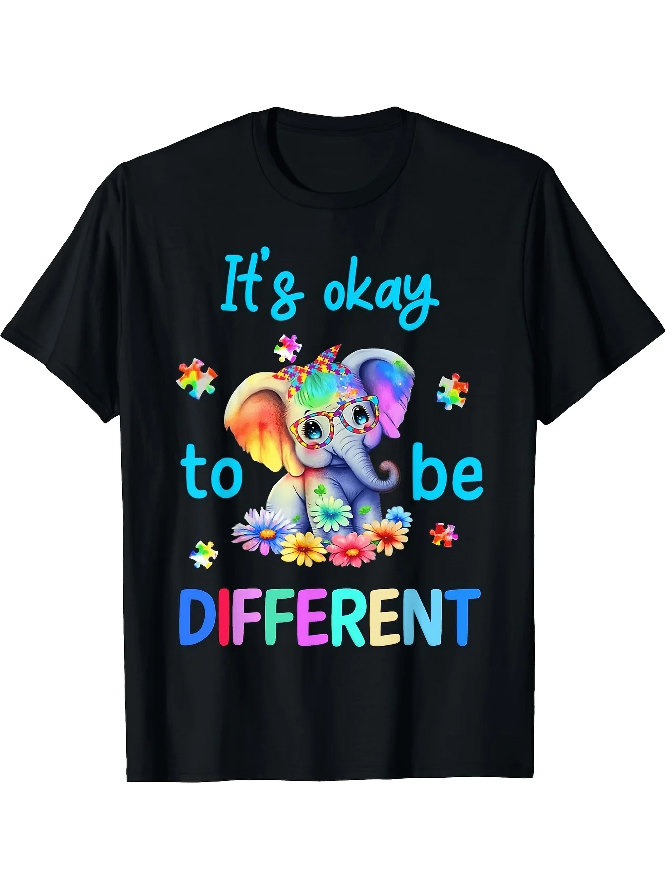 Embrace Individuality Shortsleeved Tshirt Vibrant Black Tee with Colorful Cartoon Baby Elephant Design Featuring Puzzle Pieces and'It's Okay to Be Different' Message in Rainbow Colors Plusretro Casual Short-Sleeved T-Shirt with a Round Neck