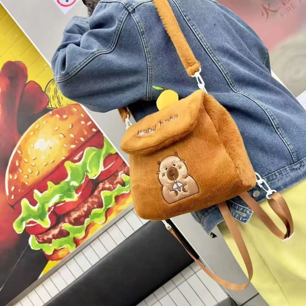 Orangefarbener Capybara-Plüsch-Rucksack-Kollektion, ausgestopfte Schultern, Rucksack mit doppeltem Verwendungszweck, tragbare weiche Capibala-Anime-Umhängetasche