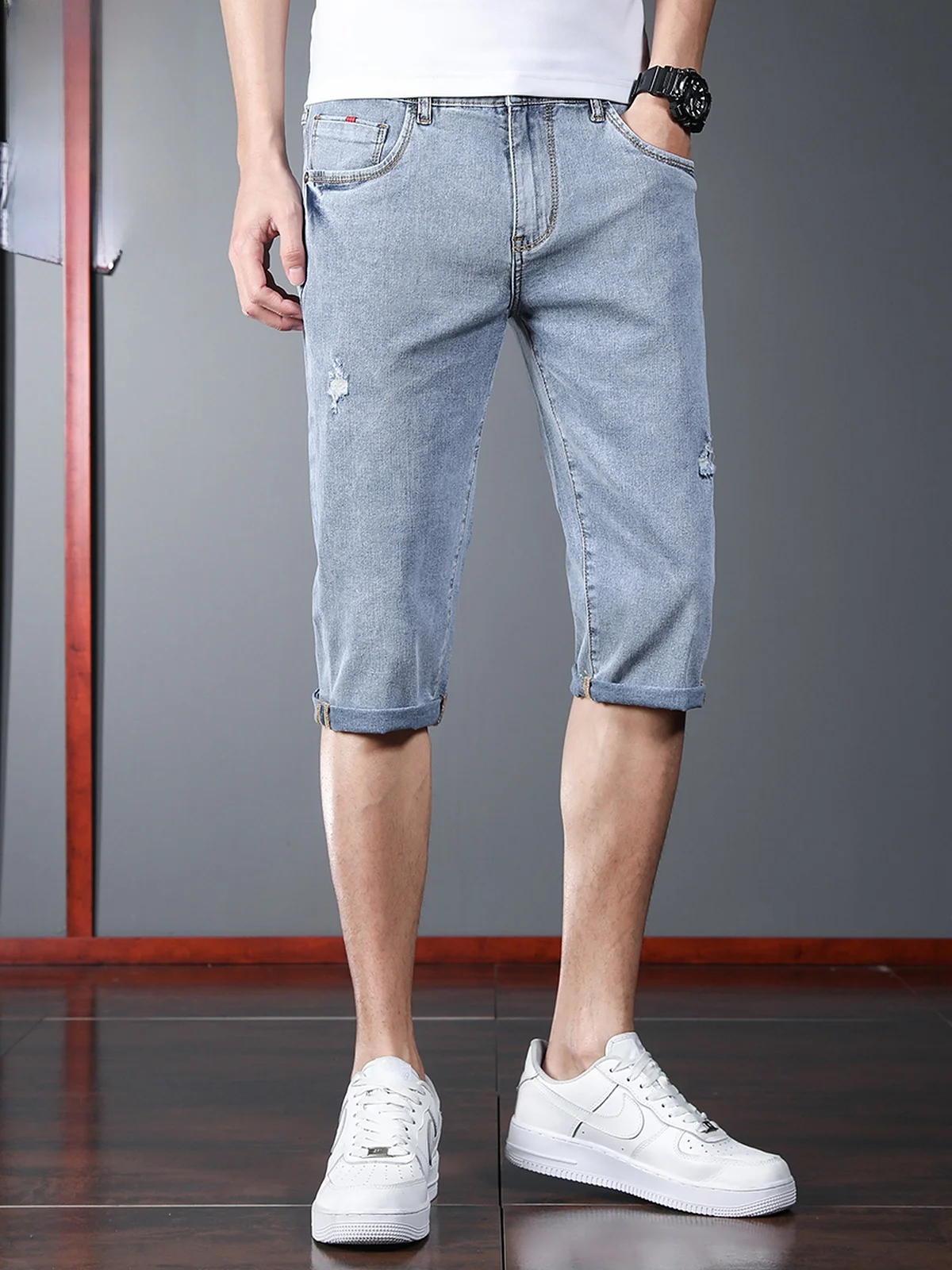 

Мужские рваные джинсовые шорты: легкие, летние, свободного кроя, повседневные, со средней посадкой, из смесового хлопка, молодежные, модные, синие джинсовые шорты