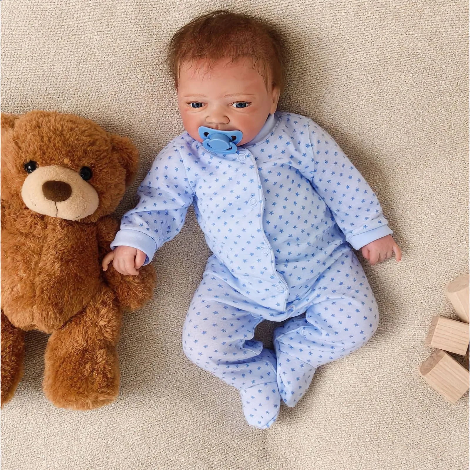 

Lifelike Baby Doll, 50 cm, Blue Star Printed Outfit, Comes with Bottle