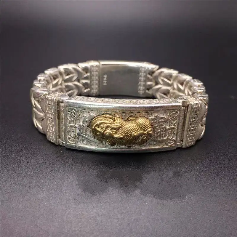 Delicate ancient Chinese Xizang silver gold - plated hand - carved PI xiu bracelet with hollow-out