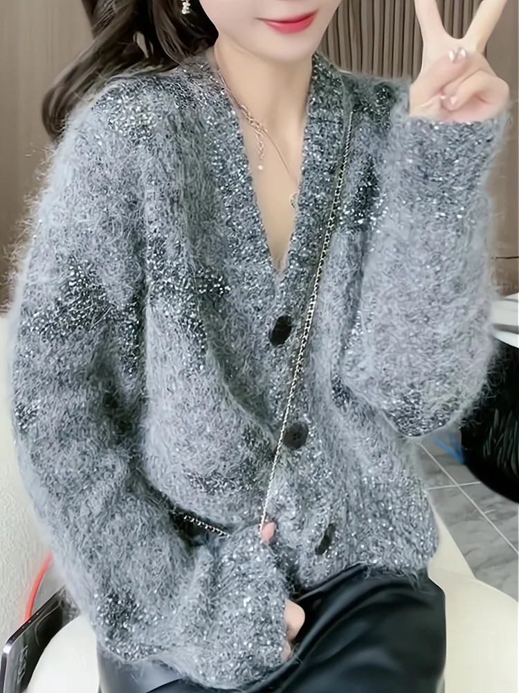 

Autumn Winter 2025 Women's Lazy Sle Long Sve Knitted V-Ne Camere Cardigan Thi Faionable Open-irt Sle Sweater...