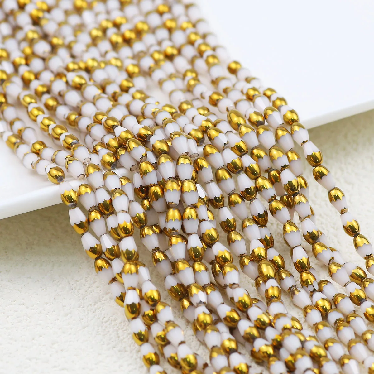 

Beige Faceted Golden-Covered Crystal Teardrop Bead Glass 3mm Loose Beads For Jewelry Making DIY Bracelet Earrings Accessories