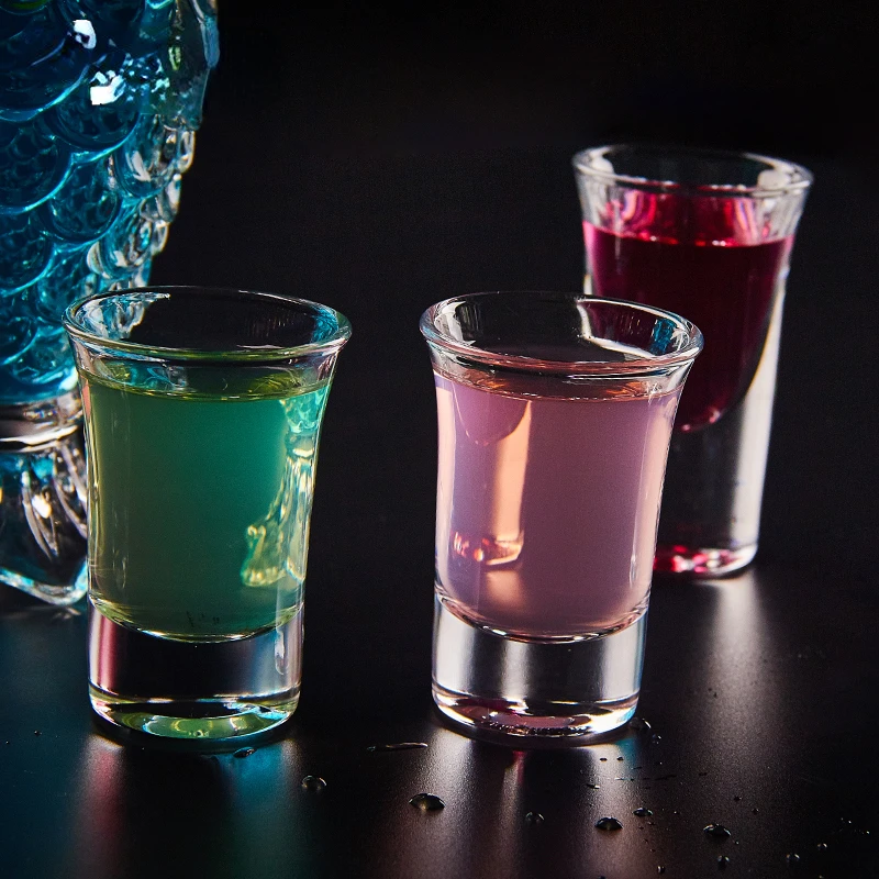 

Glasses, small spirits, wine glasses, bullet glasses, with glowing cocktail stand glasses