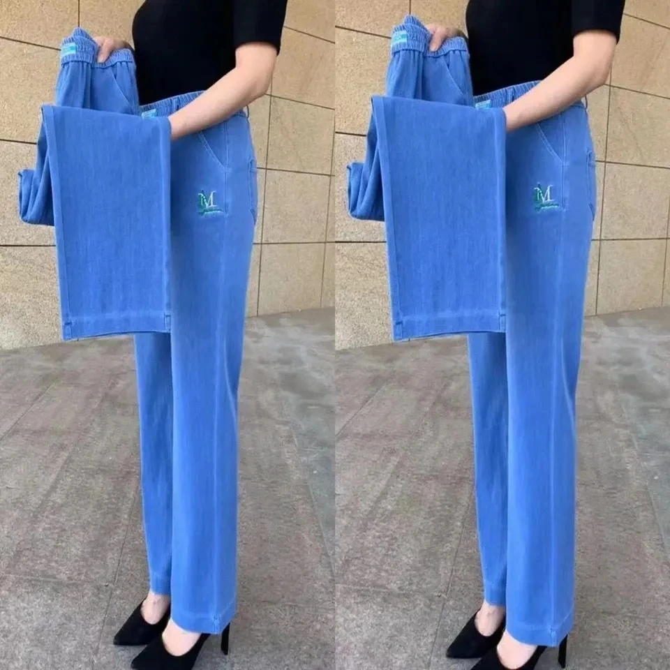 Duże rozmiary w średnim wieku damskie elastyczna bawełna dżinsy wiosna lato Stretch spodnie dżinsowe haft Casual spodnie jeansowe matka 5XL