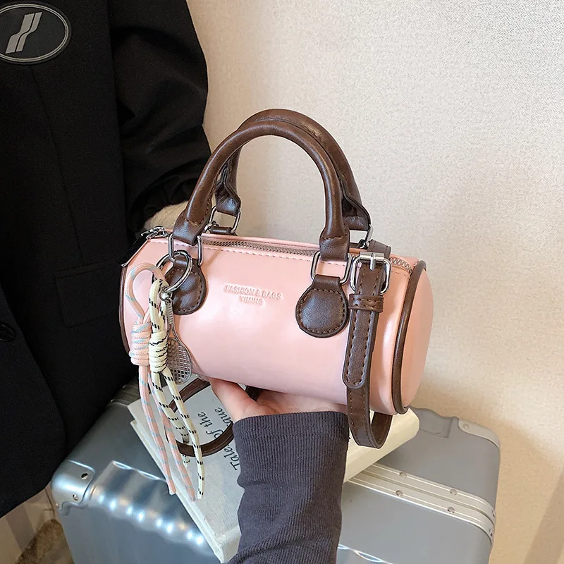 

2025 SS Retro Color-block Mini Bowling Bag Women's Luxury Handheld Crossbody
