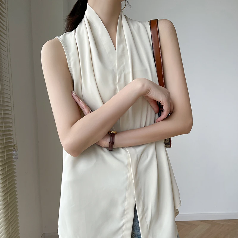 

Женская тонкая блузка Sana Summer 2023 с V-образным вырезом, однотонная, для повседневной носки, приталенная, с эффектом стройности, модель Sensation Slimming.