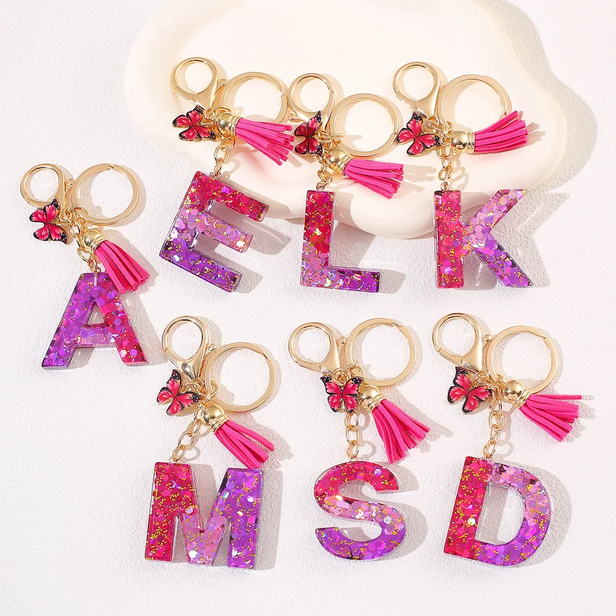 Pierwsze litery brelok dla kobiet dziewczęcy plecak żywica A-Z alfabet wisiorki gradientowy czerwony motyl breloczek słuchawki Decor