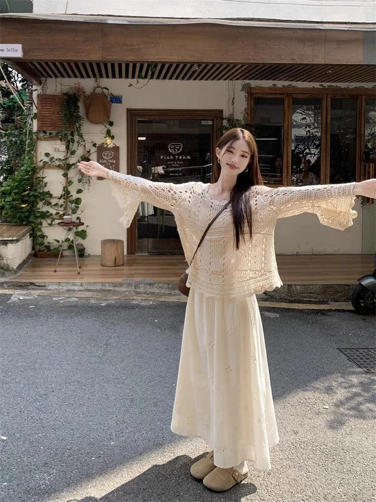 

Korean Style Hollow out Long Sleeve Knitted Top And Half Skirt Two Piece Set for Women Early Autumn Travel Hook Flower Design