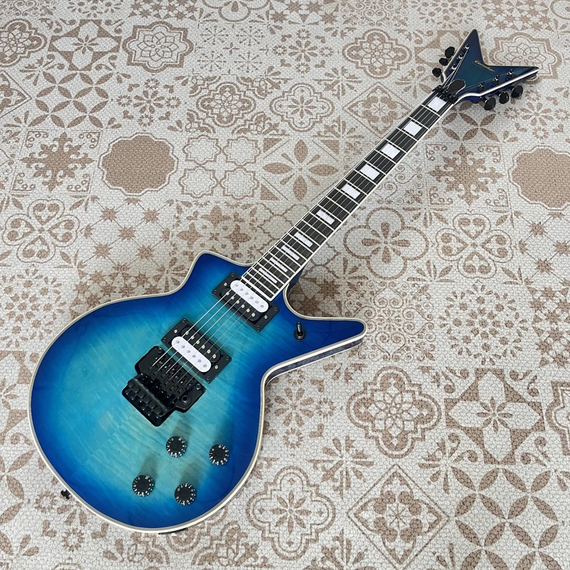 High-quality electric guitar, oddly shaped guitar, blue tiger stripe veneer, double locking tremolo, black hardware, in stock