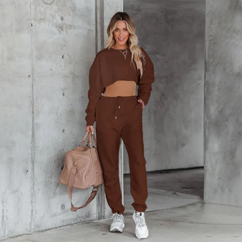 Autunno nuova felpa con cappuccio ultra corta casual pantaloni lunghi da donna set da 2 pezzi moda elastico in vita con lacci tasca pantaloni lunghi set di abbigliamento sportivo