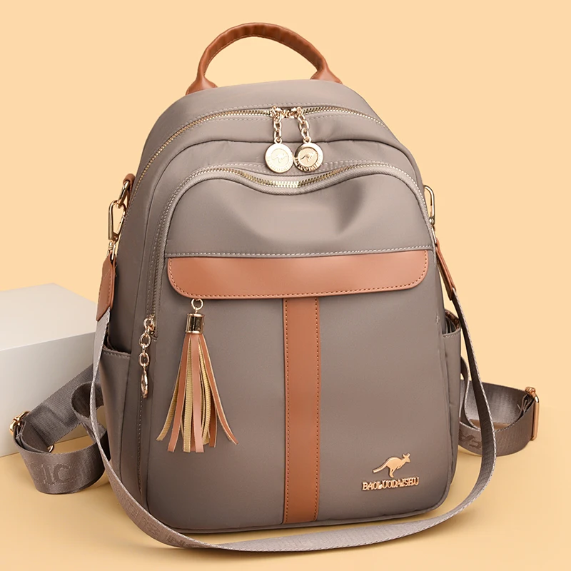 

New Fashion Tassel Backpack for Women Large Capacity Travel Backpack Oxford Bag Durable Casual Shoulder Bag for Daily Commute