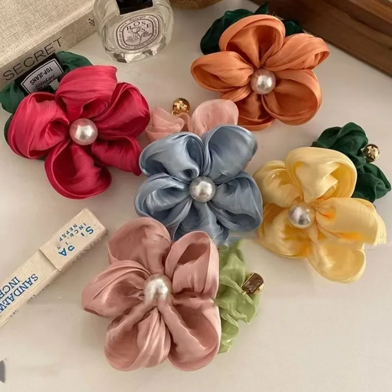 

Pure and desire pearl flower large intestine hair tie, high-end versatile forest style, durable for tying hair, high elasticity
