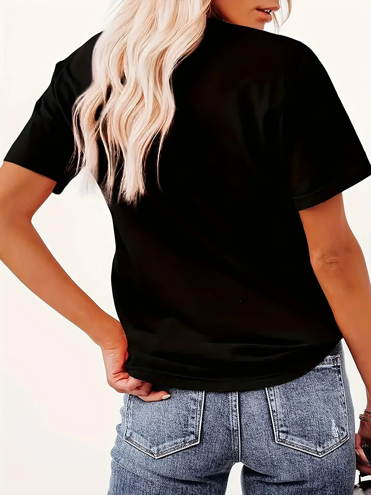 Women's Fun Christmas Cat T-shirt - Cute Black Cat with "Thank goodness you are" slogan, featuring mistletoe and Christmas tree