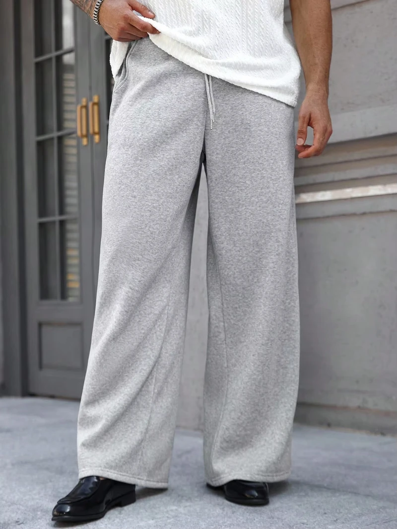 

Plus Size Men's Solid Color Drawstring Waist Pockets Wide Leg Loose Casual Sports Pants Autumn and Winter Sweatpants