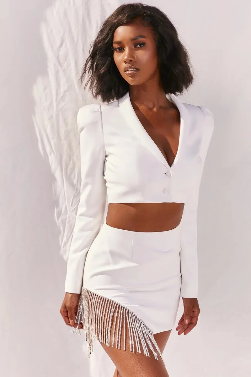Blazer corto de colores sólidos para mujer, conjunto de minifaldas informales a la moda, conjunto de falda con borlas y diamantes, traje de dos