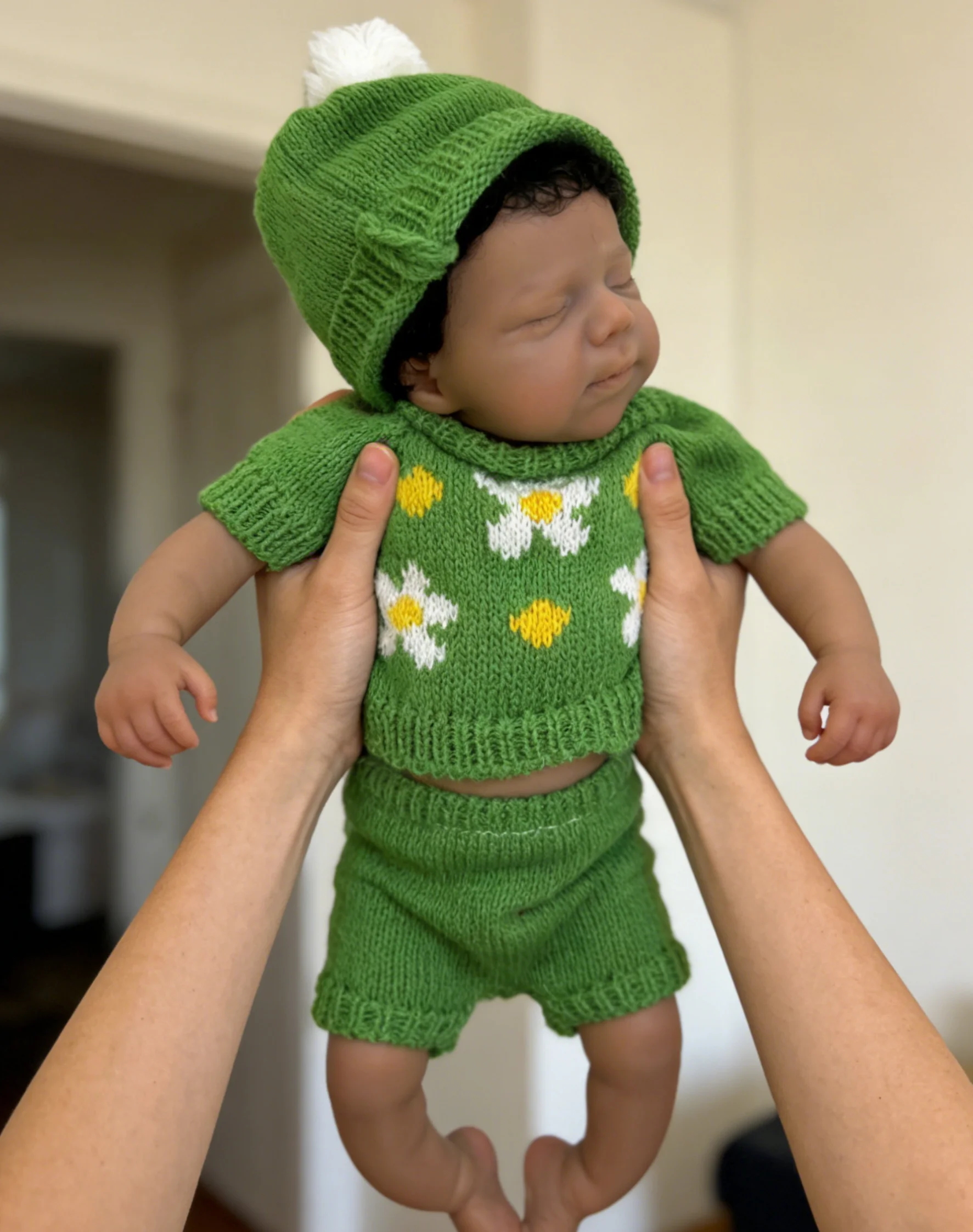 

13 Inch Dark Skin Pascale Silicone Reborn Doll with Curly Hair And Green Clothes Realistic Life-Like Girl Doll
