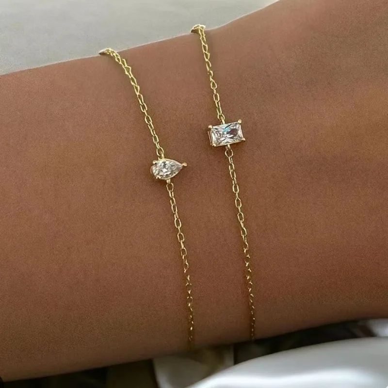 

Joolim Jewelry Wholesale High End PVD Fashion Dainty Rectangular&Teardrop Zircon Fine Chain Stainless Steel Bracelet for Women