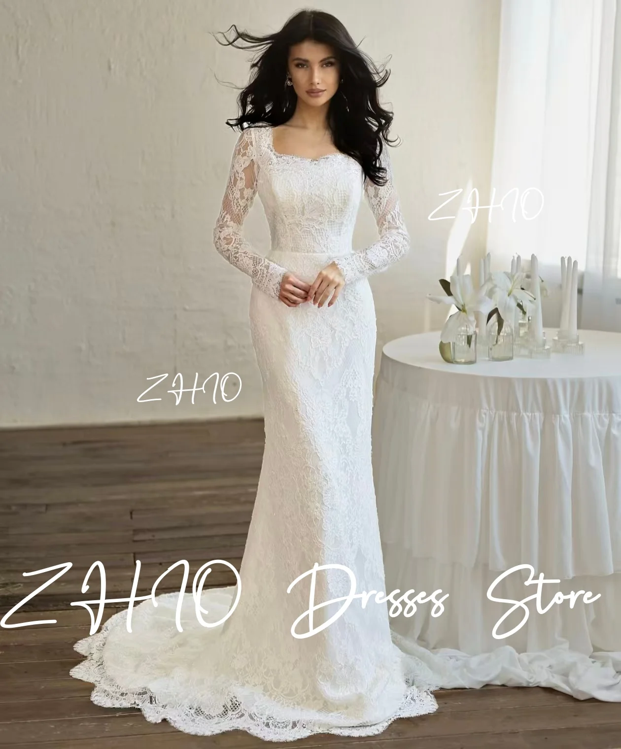 ชุดแต่งงานลูกไม้สีขาวหรูหรา แขนยาวทรงเมอร์เมด พร้อมชายกระโปรงยาวแบบสวีปเทรน  ชุดราตรีสั่งตัดได้  ชุดเจ้าสาว