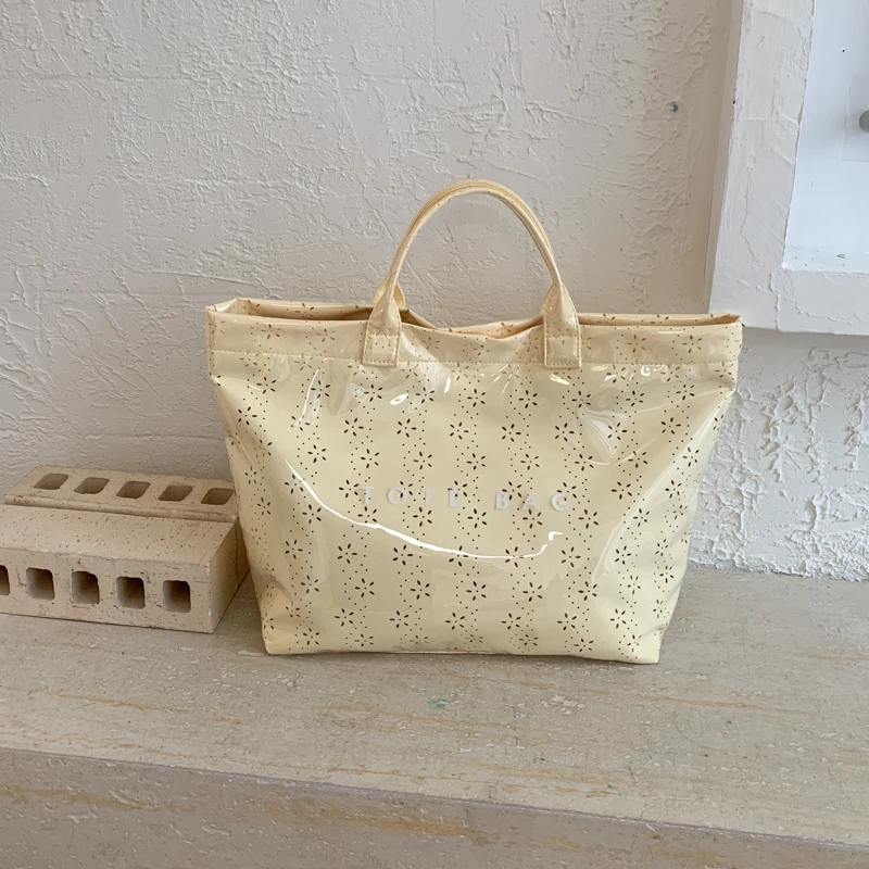 

Новая женская пляжная сумка-тоут 2026 года с вырезами в виде цветов, конфетных цветов, из ПВХ, большой вместимости, повседневная, водонепроницаемая, для ежедневного использования и путешествий