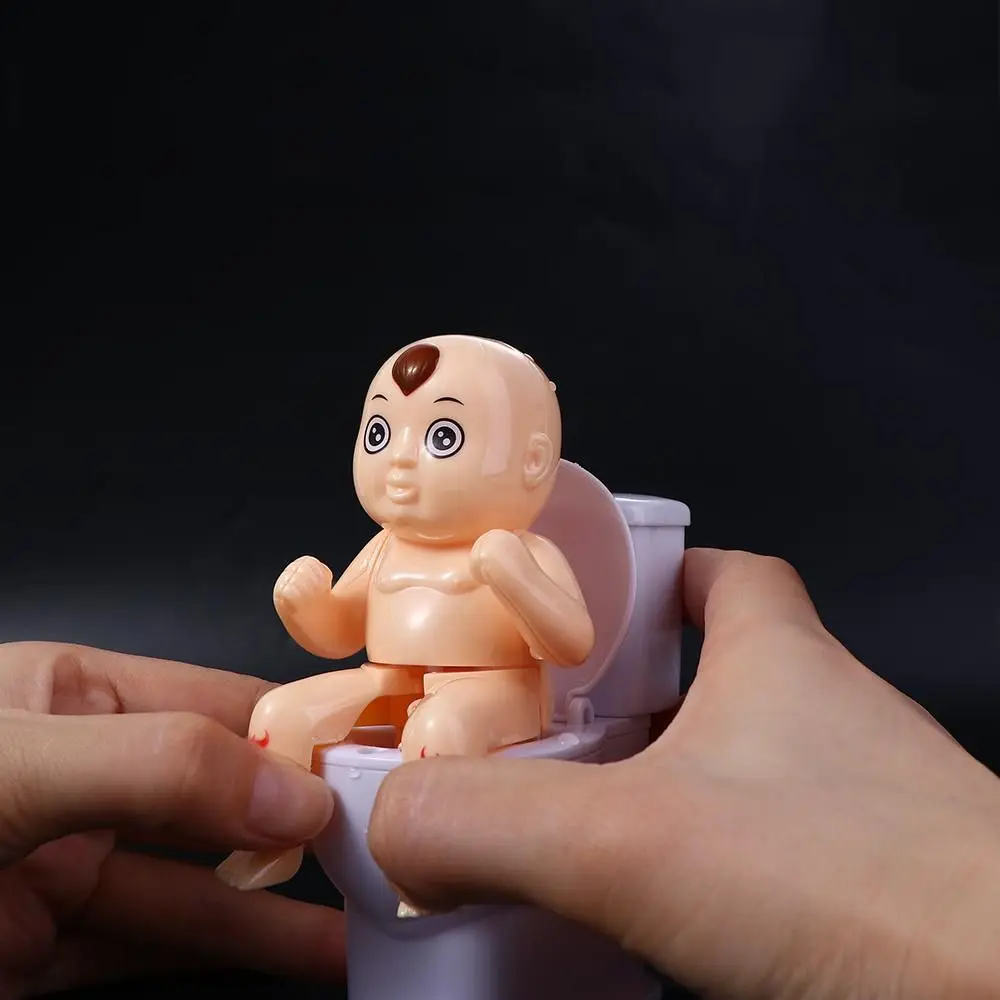 Interesting Tricky Toys Funny Spray Prank Humanoid Doll Squirt Joke Toy Mini Sprinkler Toilet Water Spray Toy Toilet Pee Boy