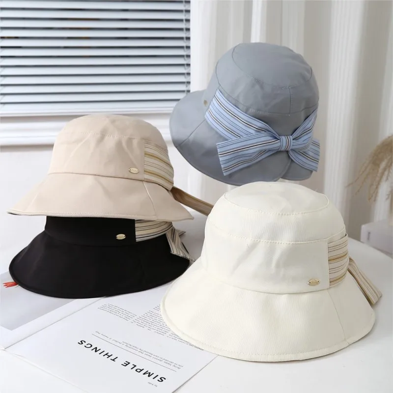 This thin striped fisherman's hat is a versatile choice for women provides looks good on the face small breathable basin