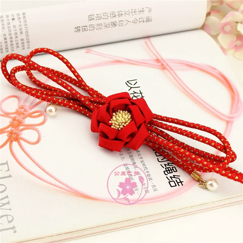 

Универсальный шнур Obi Kimono & Yukata — изысканный тканый пояс ручной работы с металлической нитью и камелией