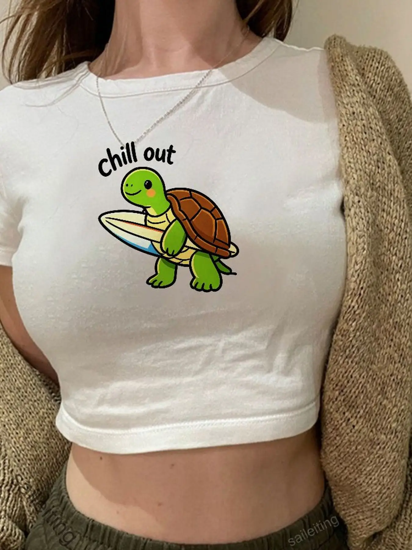 Women's Black Short Sleeve Crop Top with Cartoon Green Sea Turtle Surfing Print 