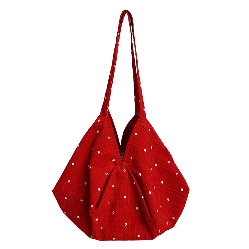 

Korean-style polka dot fabric bag for women2026New large-capacity shoulder bag with a relaxed, casual vibe, tote bucket bag