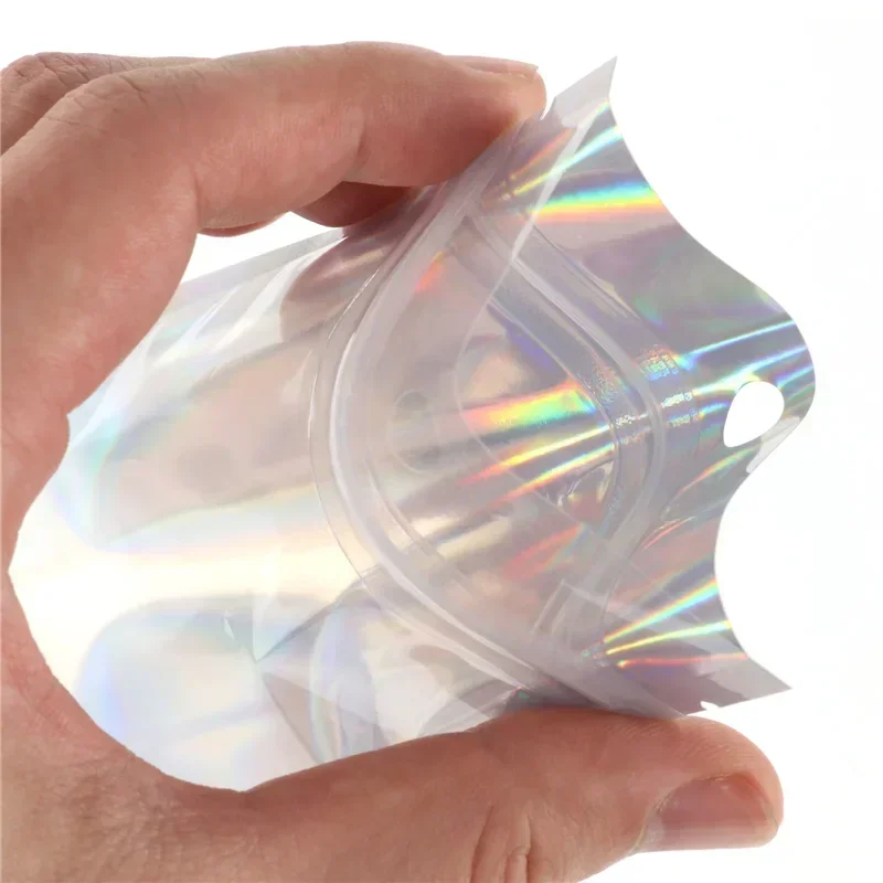 Bolsas iridiscentes con cierre de cremallera, bolsas de 100 Uds., bolsa iridiscente de plástico para cosméticos, bolsas de maquillaje holográficas, bolsa con cremallera de holograma-s