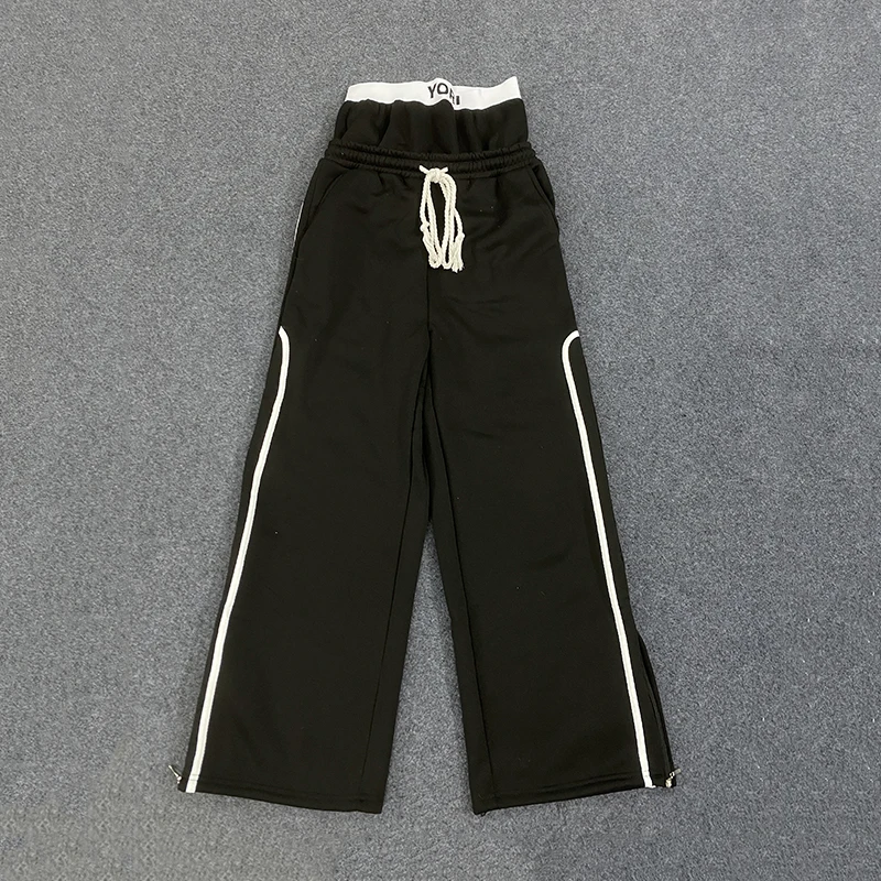 男性と女性の秋のスポーツカジュアルパンツ、ポケット付き、ドローストリング、ストライプ装飾、カップルパンツ