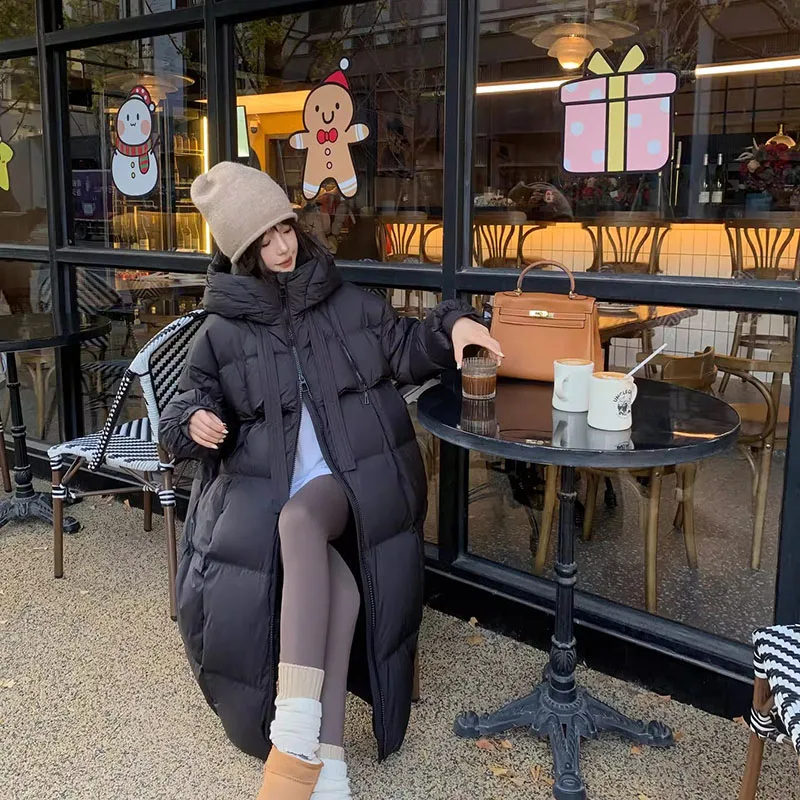 Doudoune à capuche en duvet de canard blanc pour femme, haut chaud, document solide, mode d'hiver, nouveau tempérament, H70, 2025