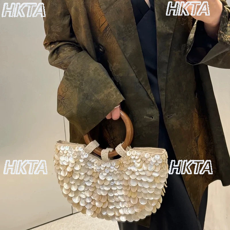 Elegante 2025 verão novo artesanal natural bege concha saco para senhoras moda nicho personalidade na moda bolsas femininas