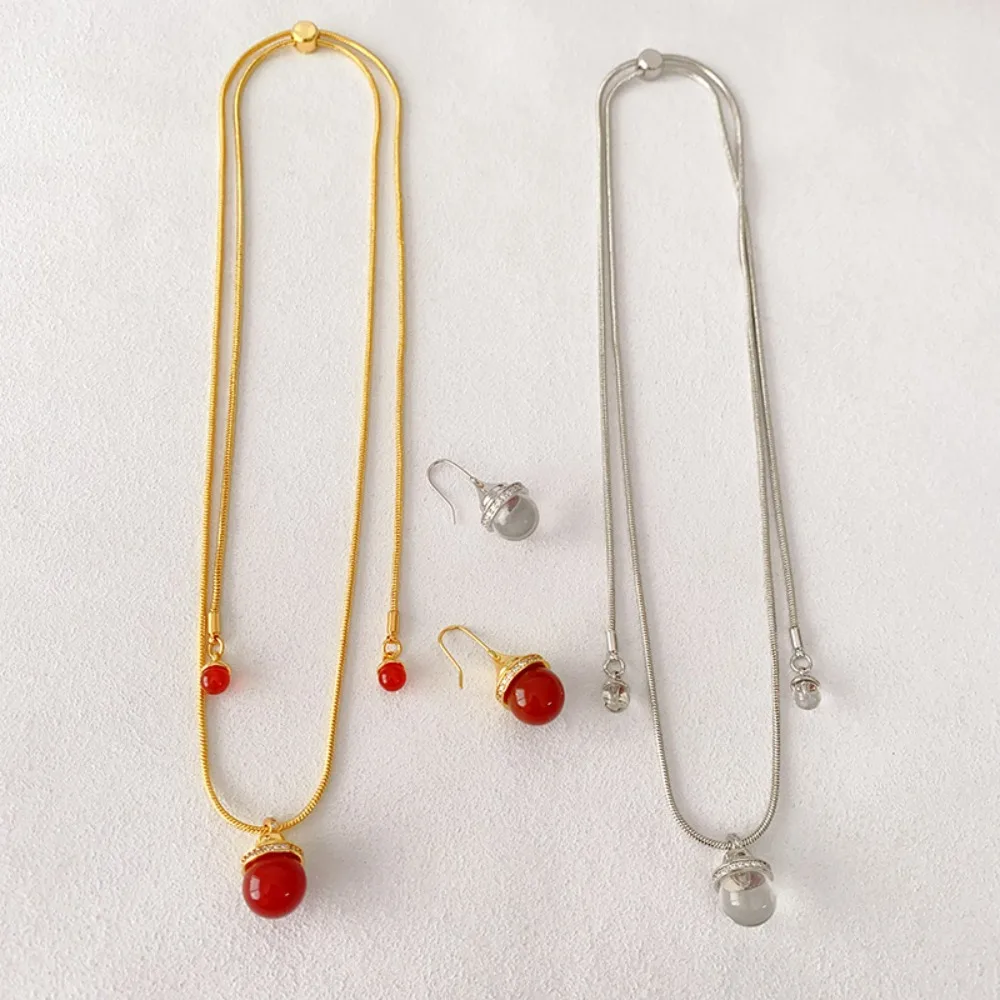 

Niche Design Inlaid Red Agate Clear Stone Bead Pendant High-end Drop-shaped Temperament Light Luxury Necklace Exquisite Ear Hook