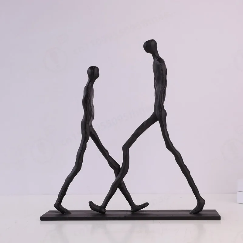 Light Luxury Cast Iron Walking Human Sculpture Black Metal Abstract Figure Statue Entryway Living Room Home Desktop Decor