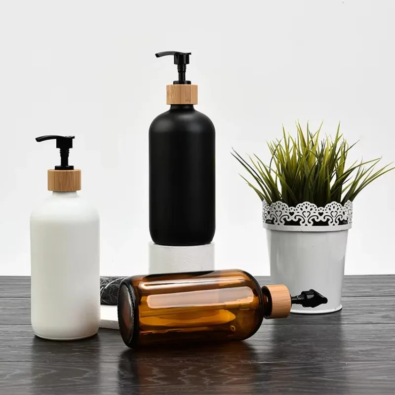 automatic soap dispensers Hot Sale Modern Empty 500ml Amber Boston Round Glass Liquid Soap Dispenser Bottle with Bamboo Hand Lot