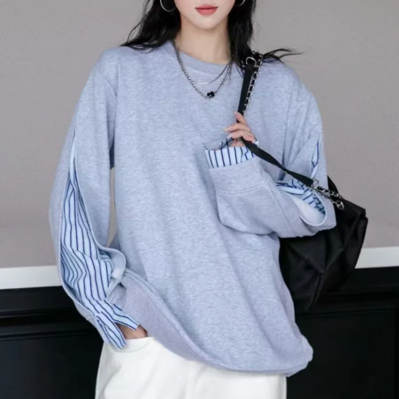 [EWQ] Fake 2 Piece Long Sleeve Striped Patchwork Sweatshirt Fashion All-match Loose Women Pullover Tops 2024 Autumn New 16O1846