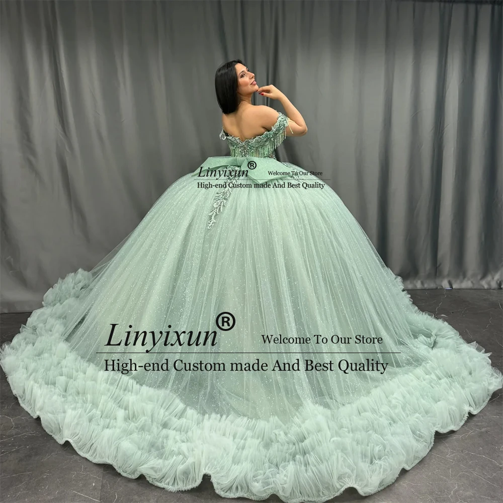 فساتين كوينسيانيرا الرائعة اللامعة لحفلات أعياد الميلاد من التل والكشكشة مخصصة بدون أكتاف فيستدوس دي 15 سنة 2025