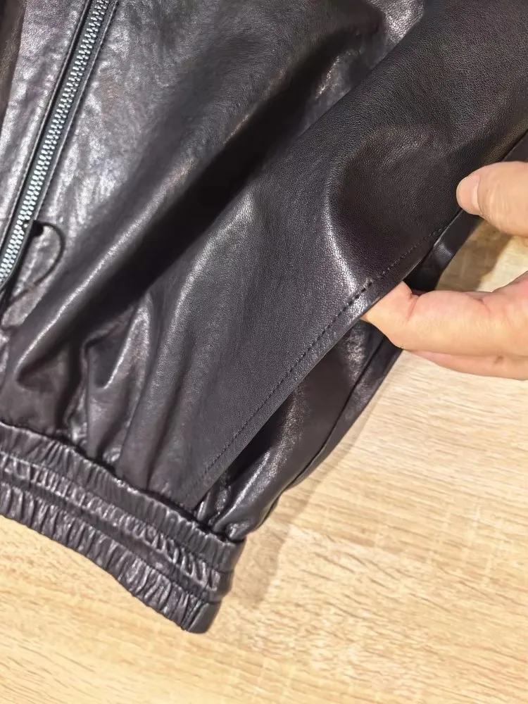 Damen Büro-Mode Elastische Taille Einfarbiger Reißverschluss-Taschen Echtleder-Rock Loser Schafsleder Knielanger Handgefertigter Rock