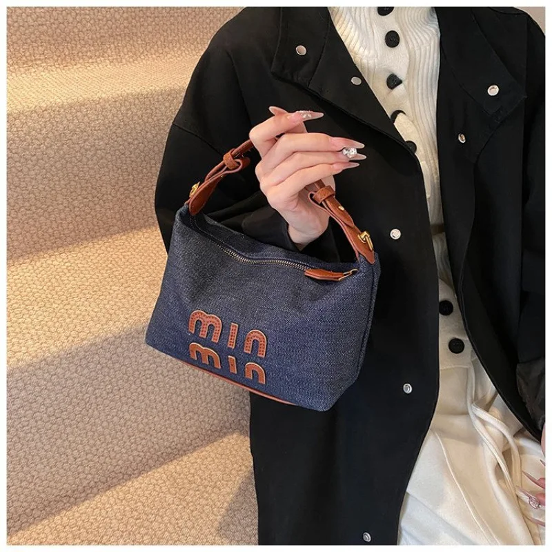

​​"2025 Retro Bucket Bag Premium Shoulder Bag Hand Chain Messenger Bag Niche Internet Celebrity Armpit Purse"​​