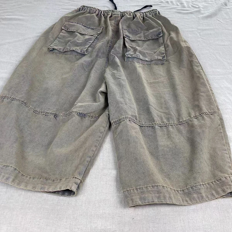 Letnie damskie spodnie jeansowe z bawełny, luźne, z elastyczną talią na sznurki, długość do kostki, łączona konstrukcja, cienkie haremki, wysoka jakość.