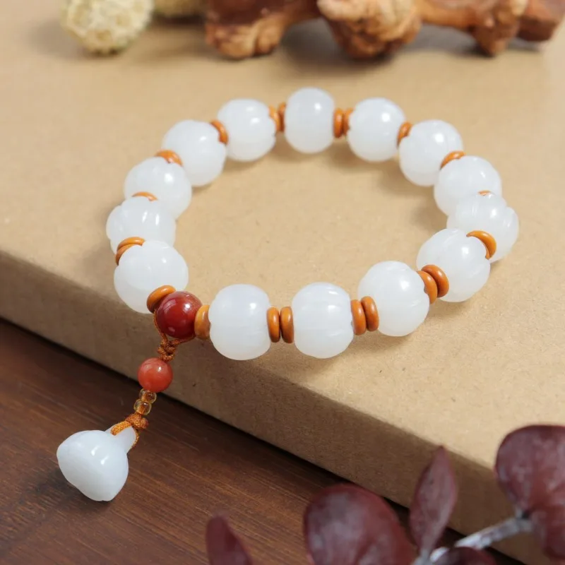 

Natural Pumpkin Bead Bracelet, Gold Silk Jade Lotus Pod Pendant Bracelet.