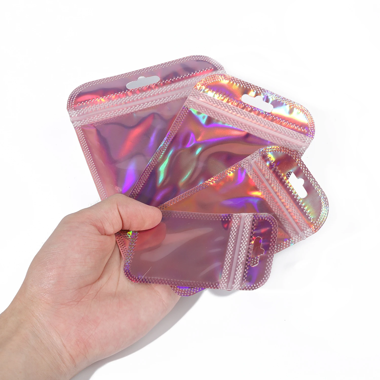 Wholesale 25 pcs Holographic Bag Laser Rainbow Pattern Self Sealing Bag Candy Bag and Front Window Sample Bag Cosmetic Packaging