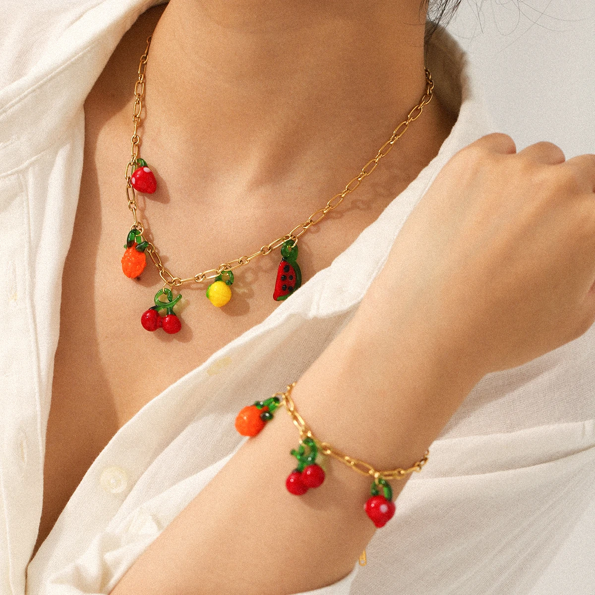 

Fashionable And Charming Women Glazed Fruit Pendant Necklace Bracelet Set Gold Stainless Steel Fashion Necklace Holiday Gift