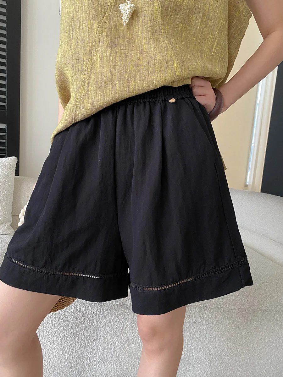 Sommerliche Damen-Shorts in unifarbenem Design mit hohler Textur, elastischem, hohem Bund, schlank machendem und lockerem, weitem Bein. – Detail 26