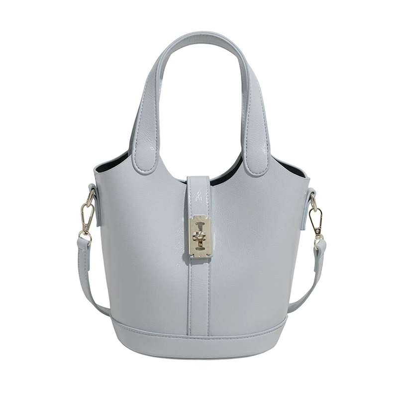 シンプルで豪華なユニークなおむつバッグ：女性用クロスボディメッセンジャーバッグ、レトロな雰囲気と文字ロゴが付いたエレガントなレザーバッグ