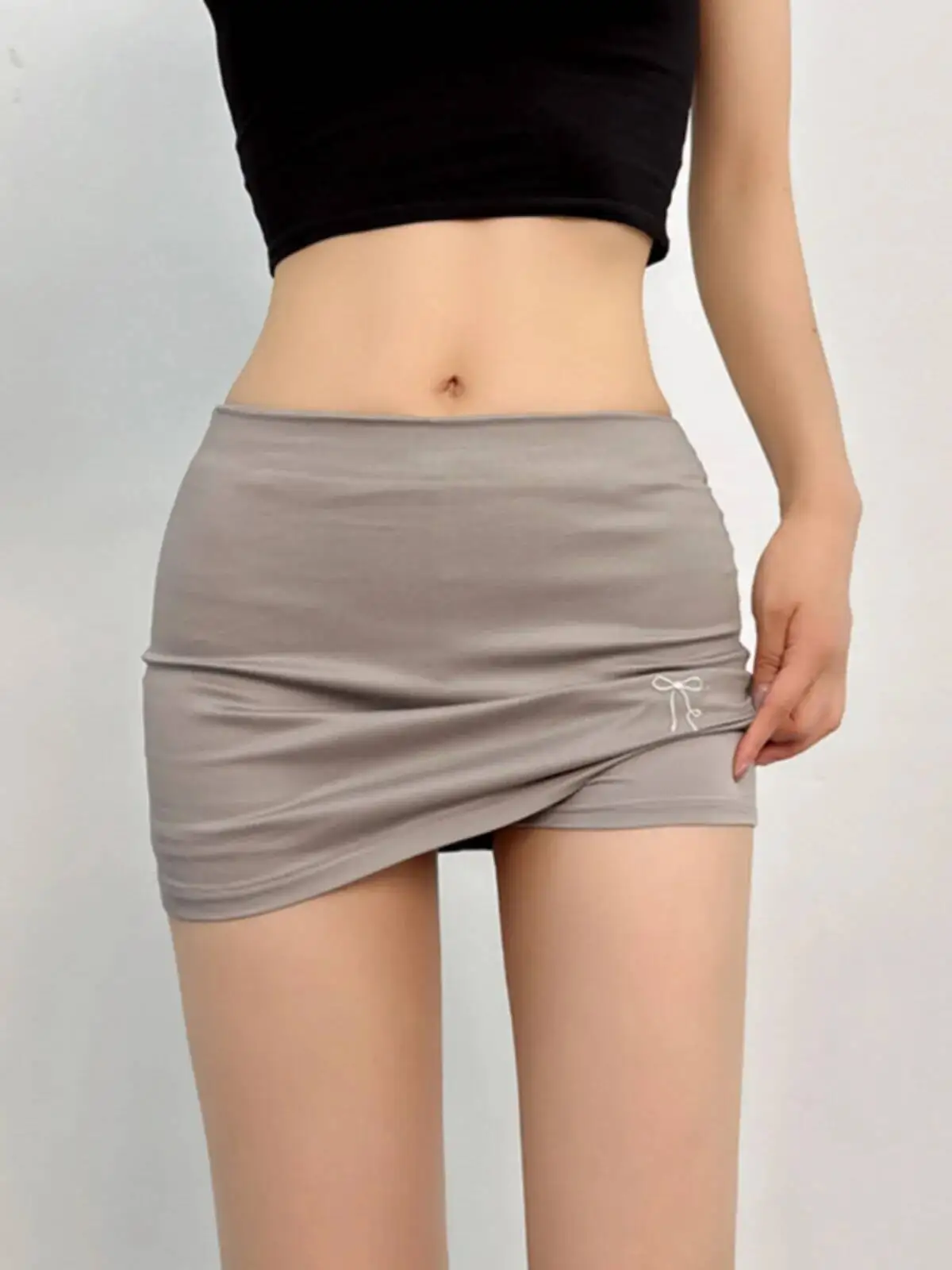 

Женская мини-юбка с низкой талией и эффектом обертывания, однотонная, с вышивкой бантом, облегающая, короткая, универсальная, для отдыха, лето 2026, новинка 4VHT